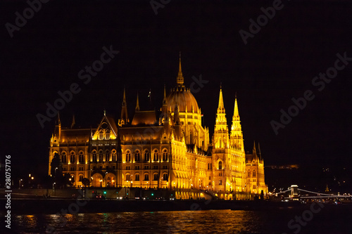 Hungarian parliament at night. View from the Danube River.