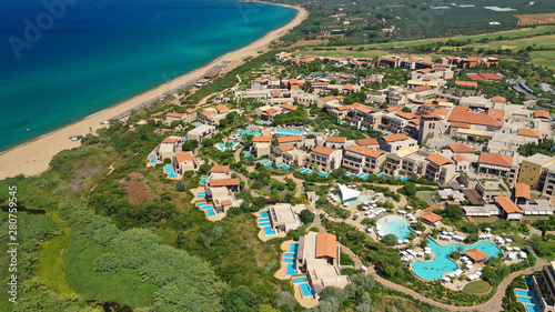 Aerial drone photo of famous sandy deep turquoise and blue exotic beach of Navarino in Messinia, Peloponnese, Greece © aerial-drone