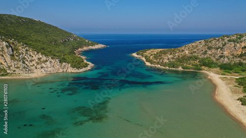 Aerial drone photo of iconic secluded sandy beach with emerald sea in island of Sfaktiria next to bay and famous beach of Divari (chrysi akti), Messinia, Gialova, Peloponnese, Greece © aerial-drone