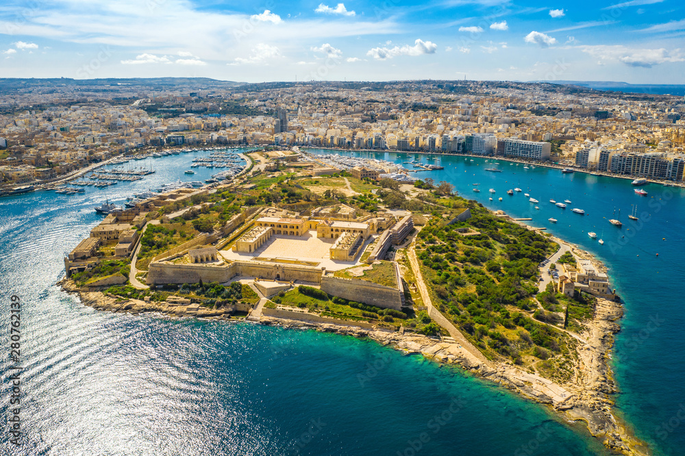 Aerial view of Fort Manoel. Manoel island. Sunny day and blue sky, clouds background. Malta Island