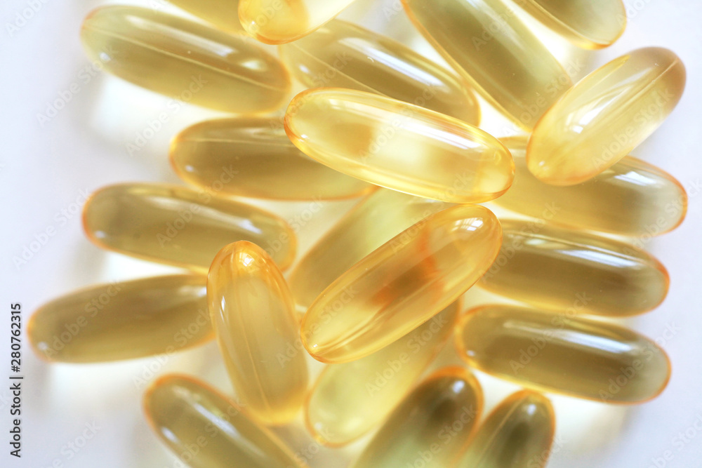 Omega capsules isolated on white Omega capsules isolated on white