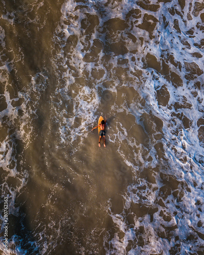 Aerial view of Surfer enjoying the fresh beach © CapturandoKilometros