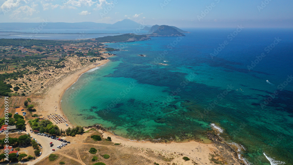 Aerial drone photo of iconic sandy beach of Amolofoi next to sandy bay of Navarino with crystal clear turquoise sea, Messinia, Peloponnese, Greece