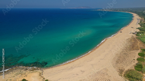 Aerial drone photo of iconic sandy beach of Amolofoi next to sandy bay of Navarino with crystal clear turquoise sea, Messinia, Peloponnese, Greece