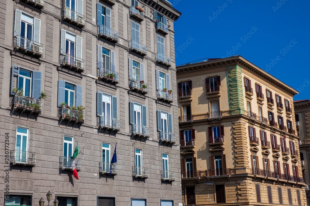 Beautiful facades of the antique buildings in Naples old city
