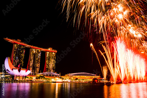 Beautiful Fireworks over Singapore Marina Bay during National Day photo