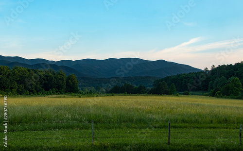 Scenic landscape in a mountain valley at sunset