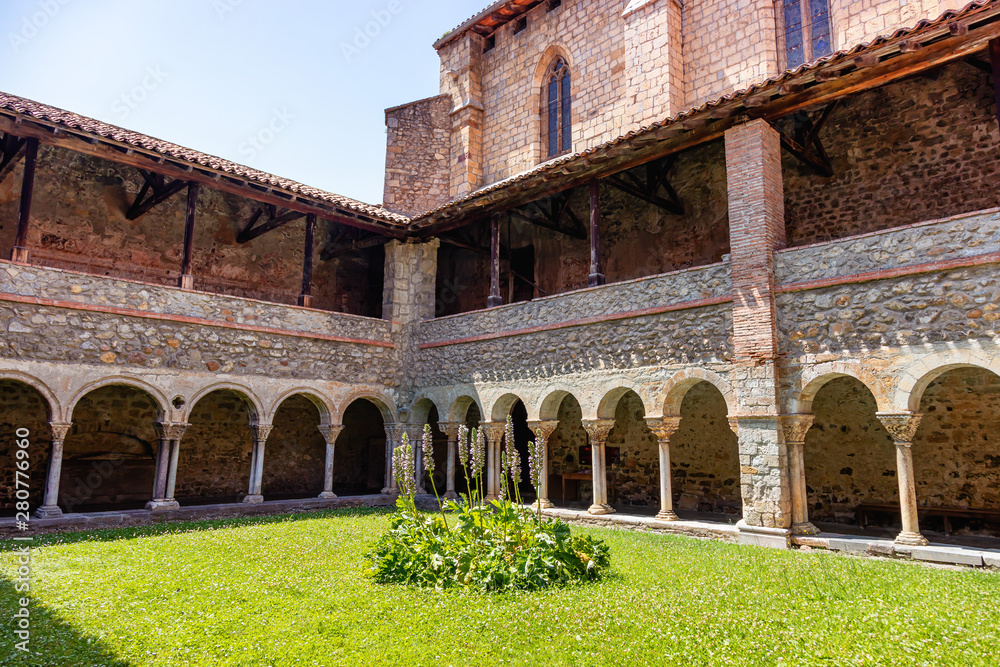 Fototapeta premium Cloister of the Saint Lizier Cathedral, Ariège department, Pyrenees, Occitanie, France