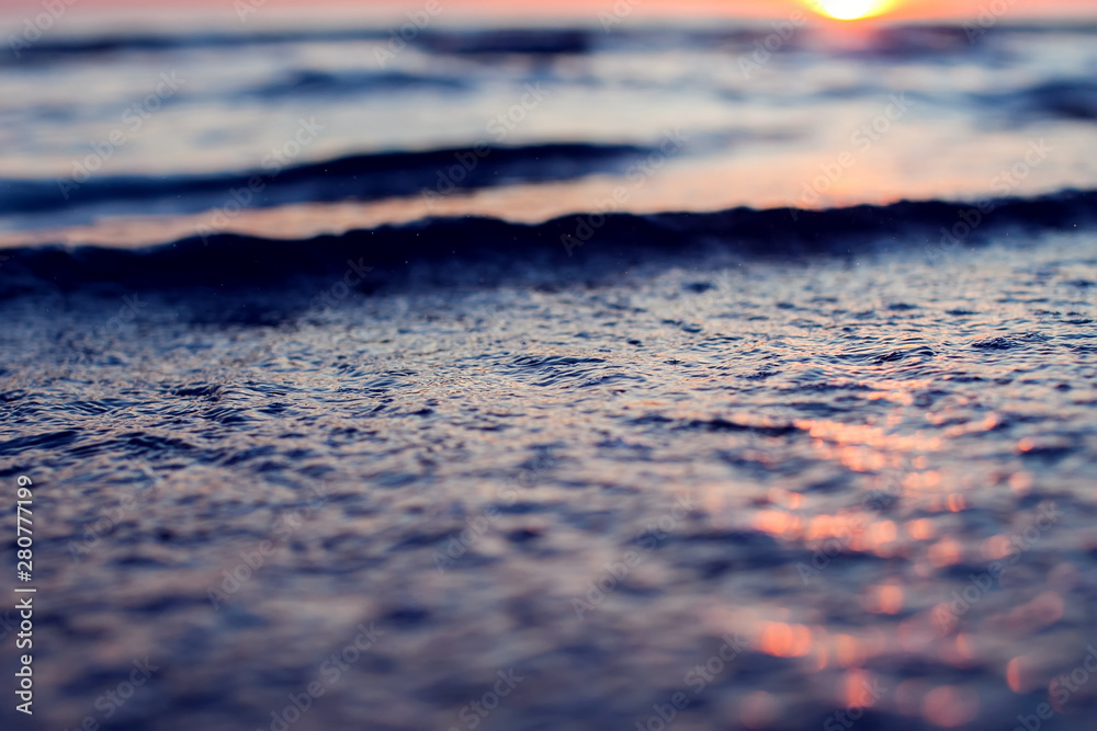 A sunset on the beach. Sea and eveninig sky with clouds A sunset on the beach. Sea and eveninig sky with clouds