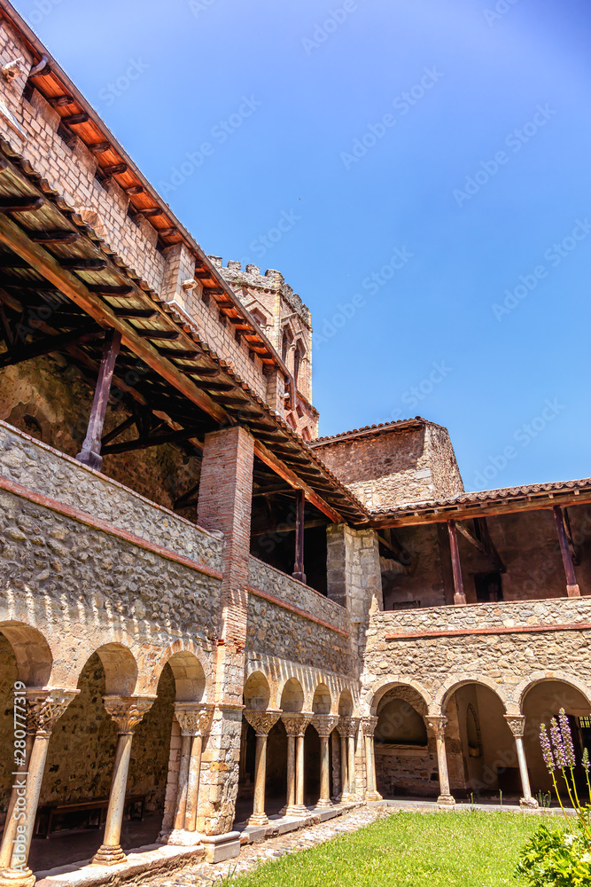 Obraz premium Cloister of the Saint Lizier Cathedral, Ariège department, Pyrenees, Occitanie, France