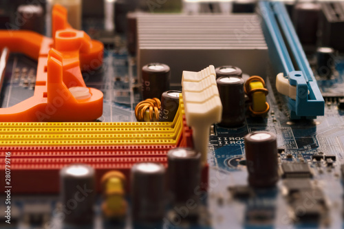 Elements of an electronic device. Computer motherboard details. Close-up. Selective focus.