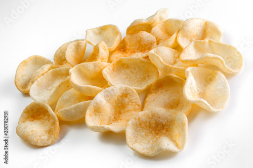 Potatoes snack with pepper on isolated white background. Closeup