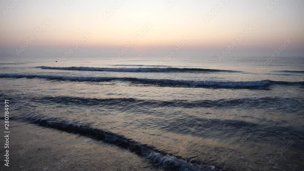 Beautiful Sunrise at the Black Sea with Water Waves