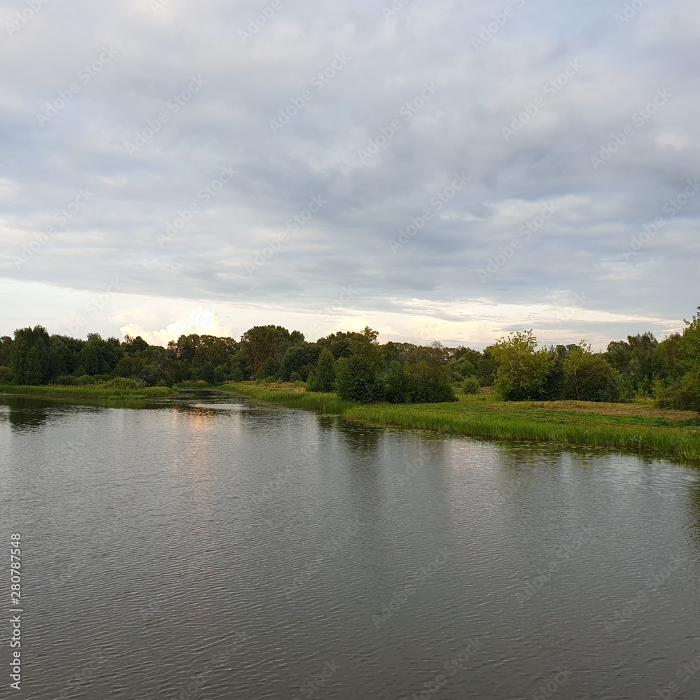 Lake in the evening. River at dusk. Ecologically clean area.