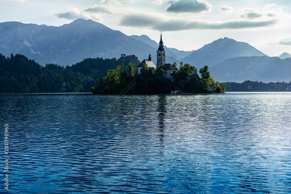Lake Bled Slovenia. Most famous Slovenian lake and island Bled with Pilgrimage Church of the Assumption of Maria and Bled Castle in background. Lake Bled Slovenia. Most famous Slovenian lake and island Bled with Pilgrimage Church of the Assumption of Maria and Bled Castle in background.