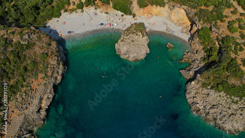 Aerial drone top view photo of iconic pebble beach of Foneas in the heart of Messinian Mani, Peloponnese, Greece