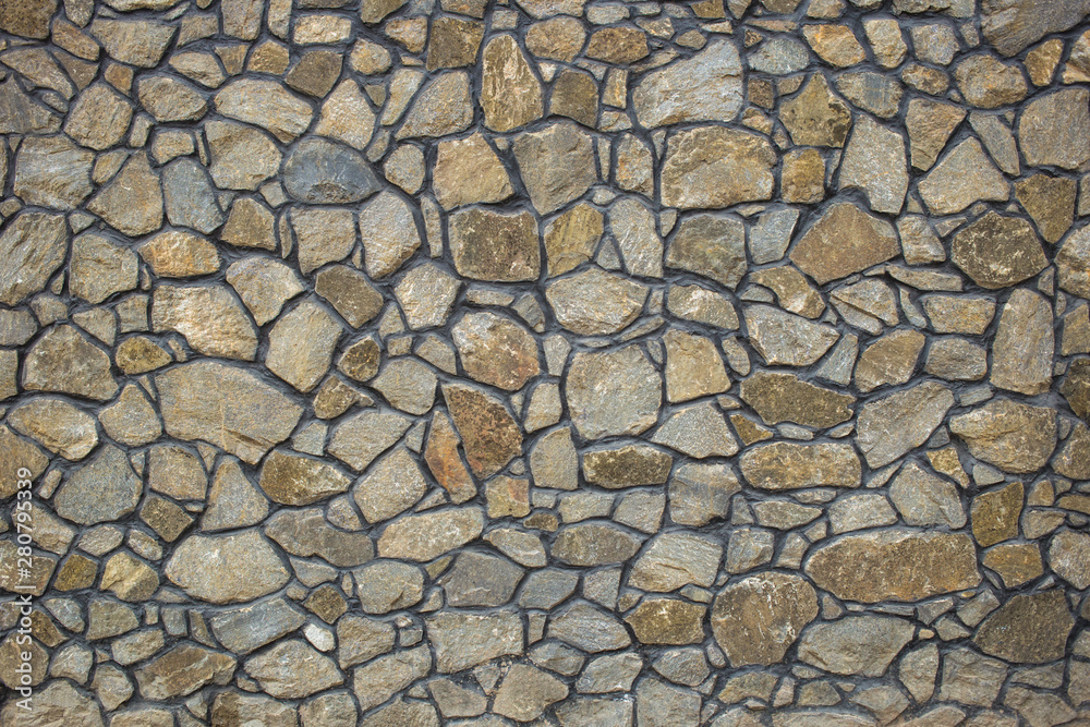 Texture of a stone wall. Old castle stone wall texture background. Part of a stone wall, for background or texture Texture of a stone wall. Old castle stone wall texture background. Part of a stone wall, for background or texture