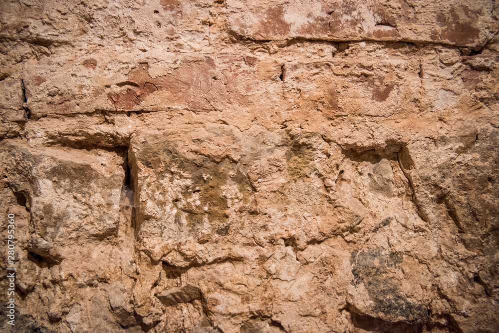 Old red brick wall, old texture of red stone blocks.