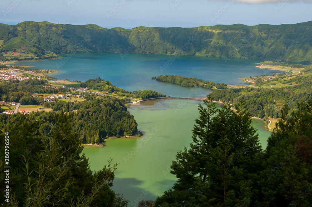 Lagoa das Sete Cidades is located on the island of São Miguel, Azores and is characterized by the double coloration of its waters, in green and blue.