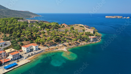 Aerial drone photo of iconic medieval castle and village of Pylos or Pilos in the heart of Messinia prefecture, Peloponnese, Greece © aerial-drone