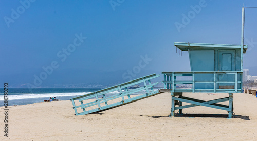 Lifeguard hut on Santa Monica beach. Pacific ocean coastline Los Angeles USA.