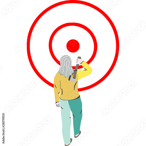 Woman throwing axe on the target.