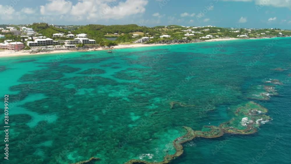 Aerial shot of Bermuda south coast with pink beach and hotels, coral reefs and coves