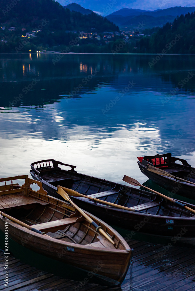 Boats at the pier of the Lake Bled, Slovenia.