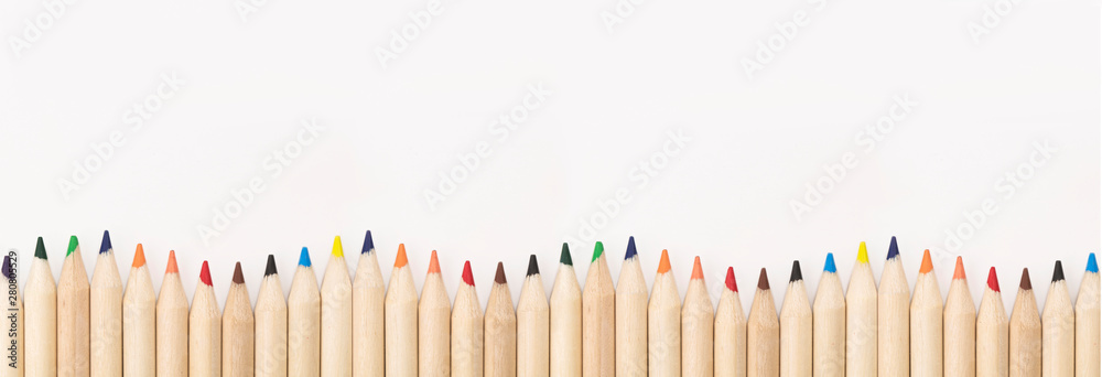 Color pencils for drawing isolated on white background with space for text. Top view. Flat lay. Back to school concept. - obrazy, fototapety, plakaty 