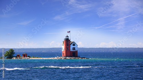 Historic light house at Round island in the middle of lake Huron photo
