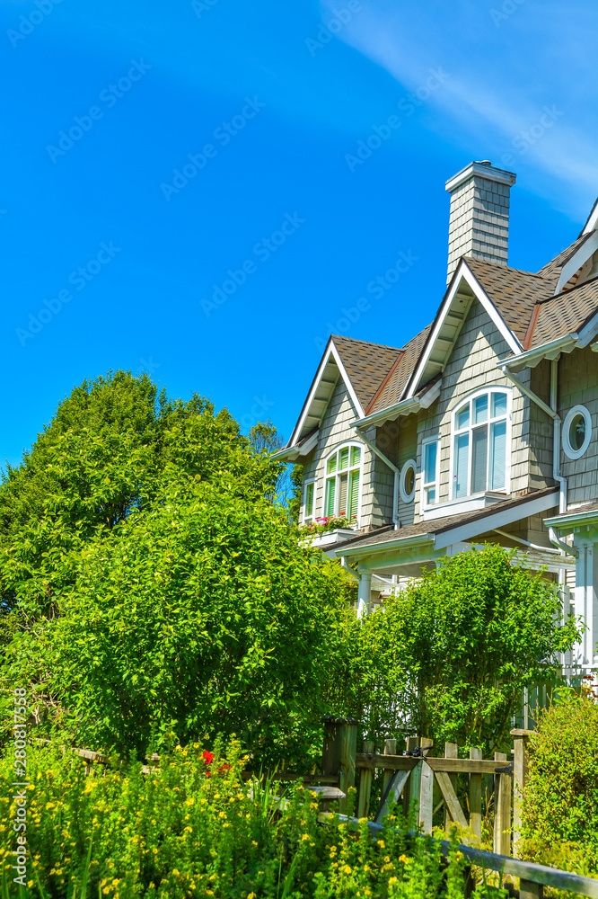 Residential townhouses on sunny day in Vancouver, British Columbia, Canada.