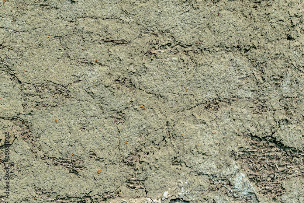 The texture of the surface of the wall, made of clay and straw. The beginning of the 20th century. Environmentally friendly materials. Good thermal insulation properties. The texture of the surface of the wall, made of clay and straw. The beginning of the 20th century. Environmentally friendly materials. Good thermal insulation properties.