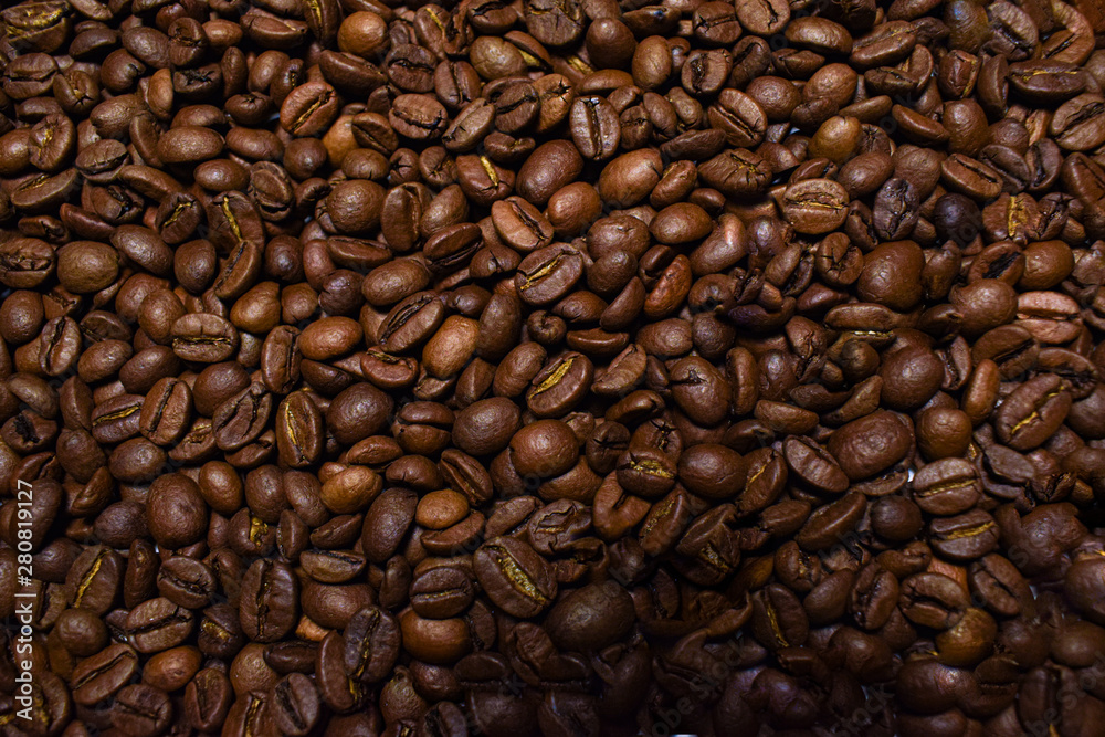 Fototapeta premium Coffee beans, roasted coffee, brown beans, background