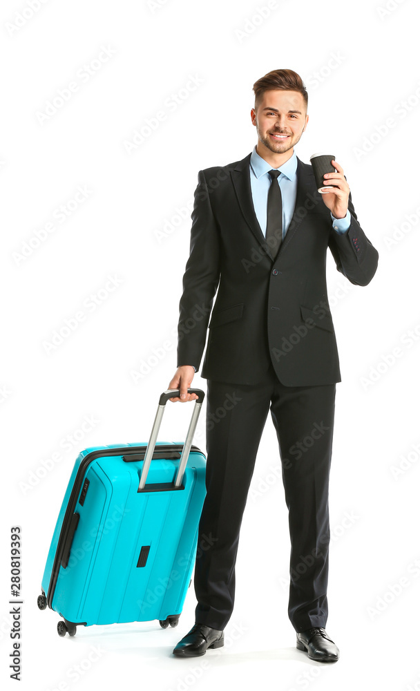 Handsome young businessman with luggage on white background Handsome young businessman with luggage on white background