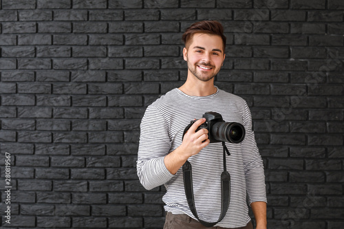 Young male photographer on ...