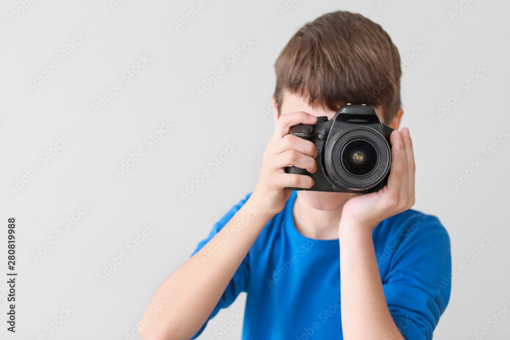 Cute little photographer on white background Cute little photographer on white background