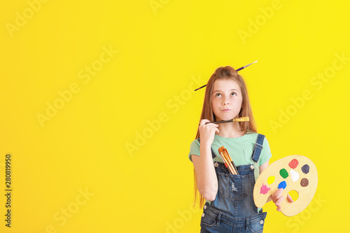 Thoughtful little artist on...