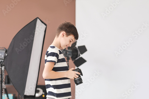 Cute little photographer in...