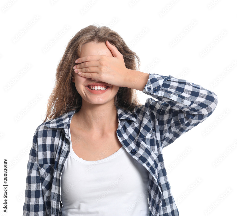 Young woman covering her eyes on white background Young woman covering her eyes on white background