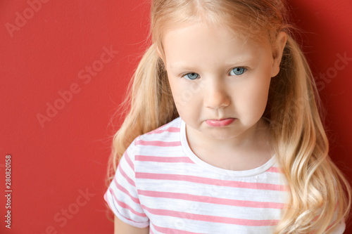 Portrait of sad little girl...