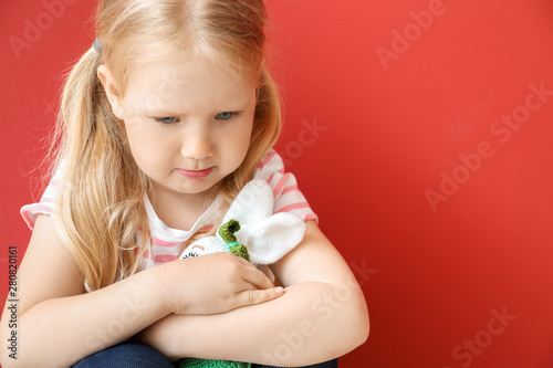Portrait of sad little girl...