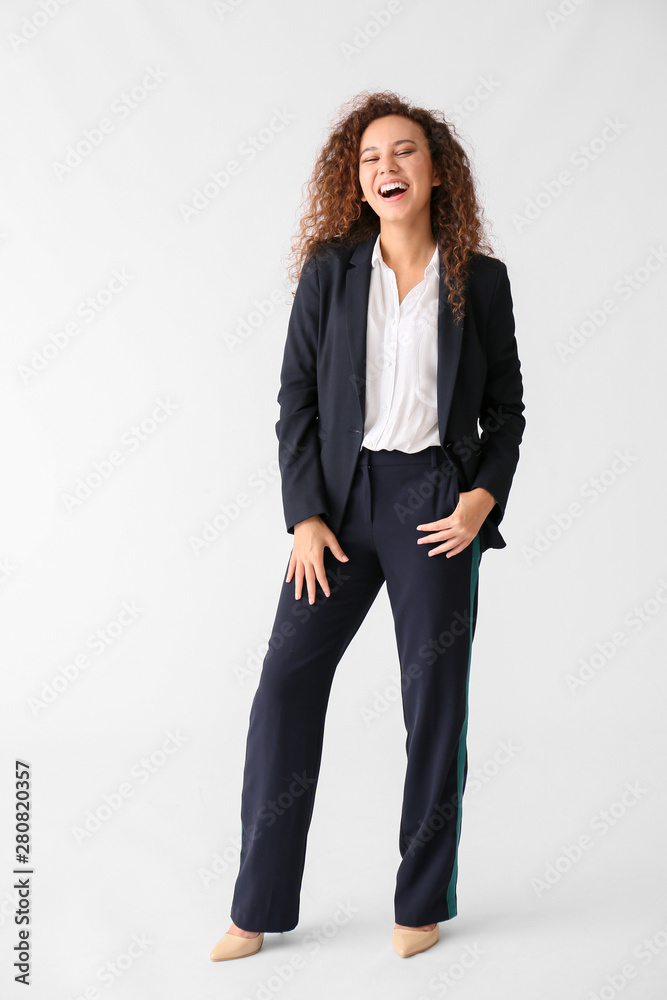 Beautiful happy African-American businesswoman on white background Beautiful happy African-American businesswoman on white background