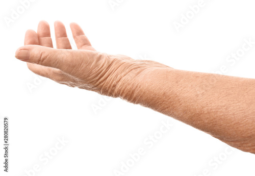 Hand of elderly woman on wh...
