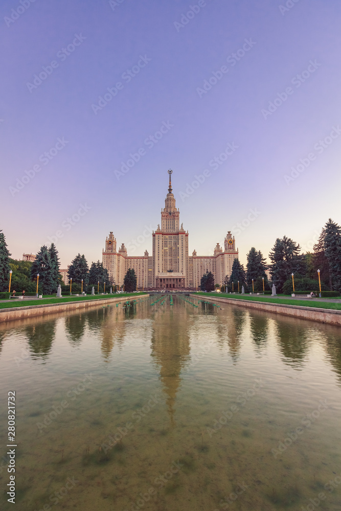 Pond in front of the Moscow State University in the evening against the sky