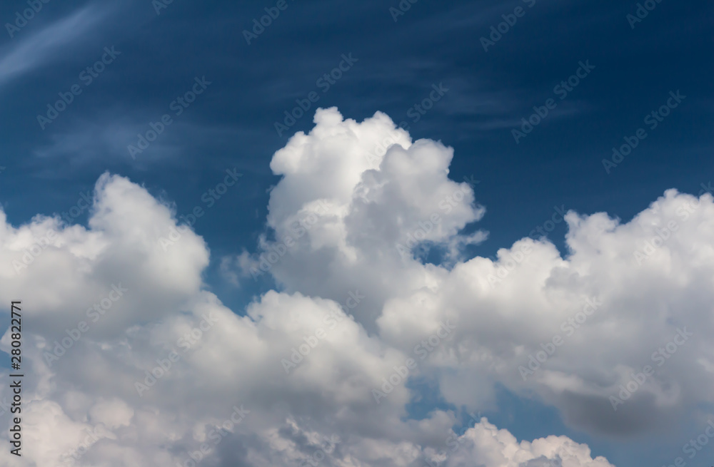 Naklejka premium Blue sky background with clouds.