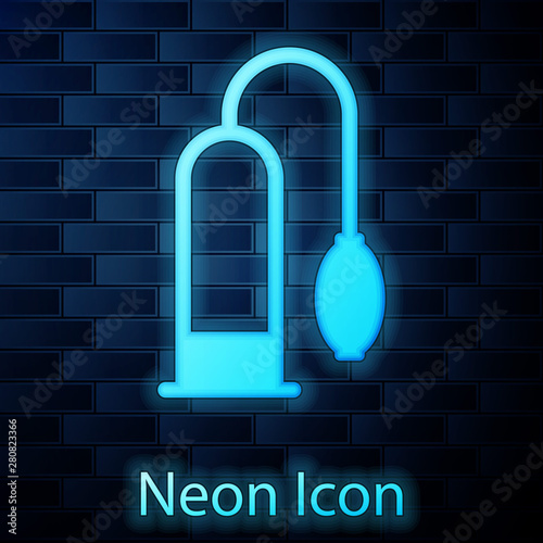 Glowing neon Penis pump icon isolated on brick wall background. Penis enlarger. Sex toy for men. Vacuum pump with a blower to increase the penis. Vector Illustration