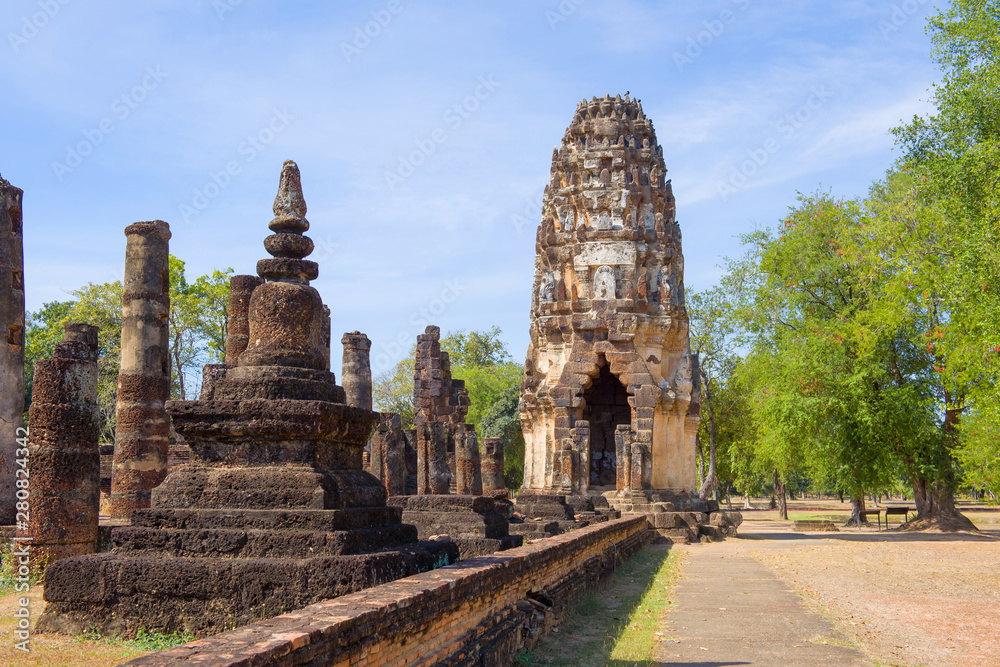 Sunny day on the ruins of the ancient Buddhist temple Wat Phra Pai Luang. Sukhothai, Thailand Sunny day on the ruins of the ancient Buddhist temple Wat Phra Pai Luang. Sukhothai, Thailand