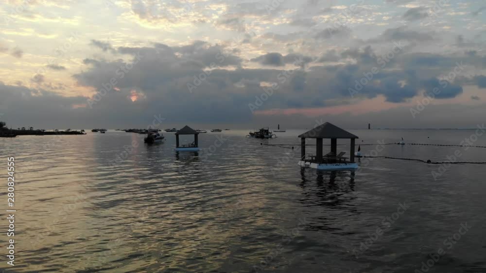 Aerial drone shot of Sunrise at Sanur Beach, Bali Aerial drone shot of Sunrise at Sanur Beach, Bali