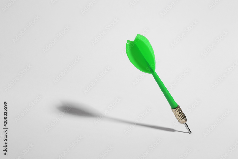 Green dart arrow for game on white background Green dart arrow for game on white background