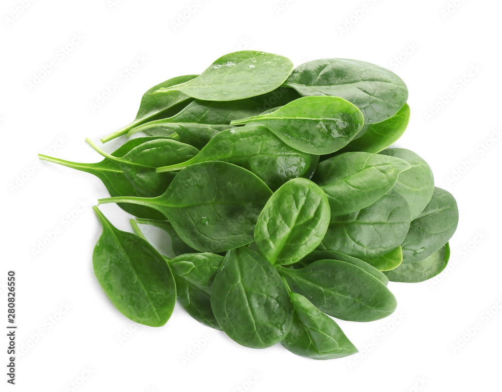 Pile of fresh green healthy baby spinach leaves on white background, top view Pile of fresh green healthy baby spinach leaves on white background, top view